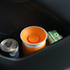 It won’t hold a regular can or bottle, but the third bin will hold a juice box.